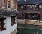 周庄古镇的最佳旅游季节是什么时候？